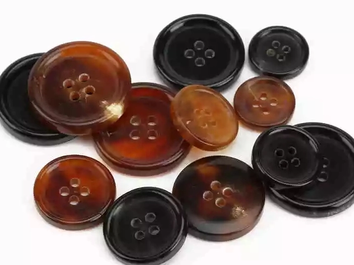 Why real horn buttons so expensive
