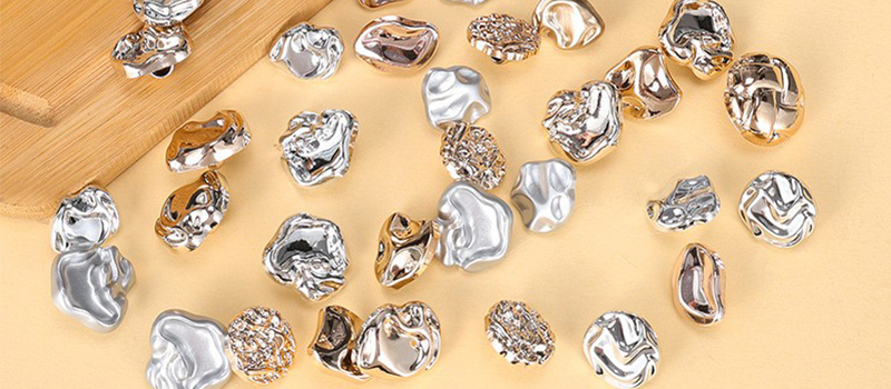 Faux-metal irregular ABS buttons